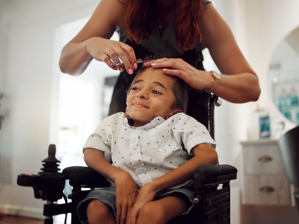 child receiving a haircut