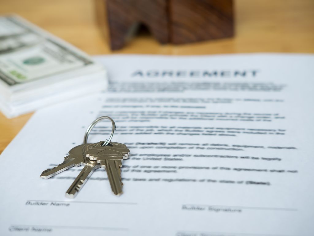 stock photo of a tenant agreement and keys